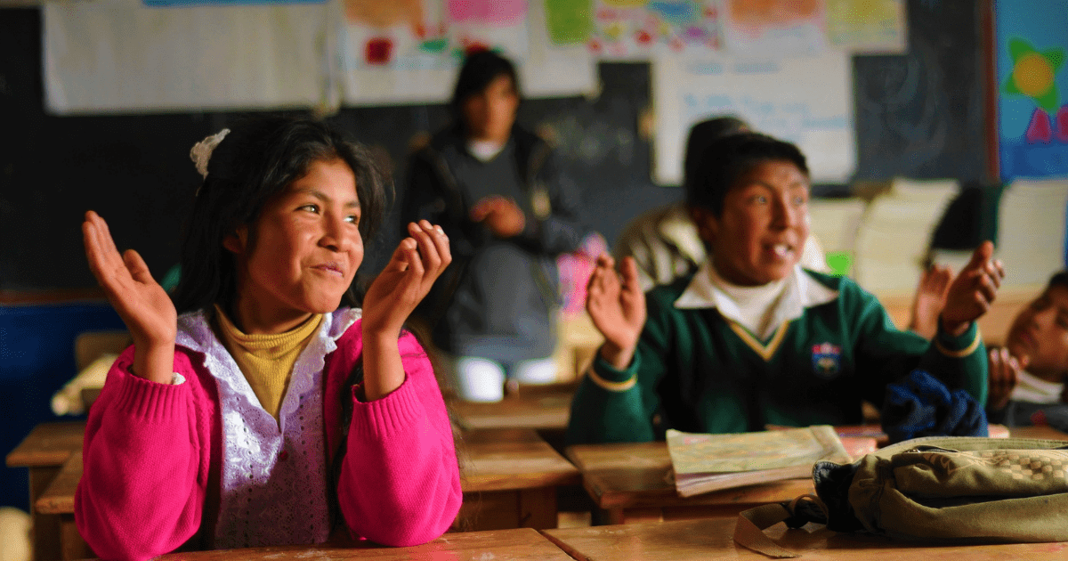 Students sitting at their desks in school